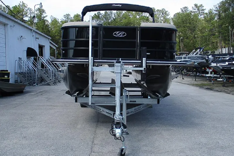 Slide: The Image of 2026 Bentley Pontoons Legacy 240 Cruise on trailer, parked outdoors. - 4