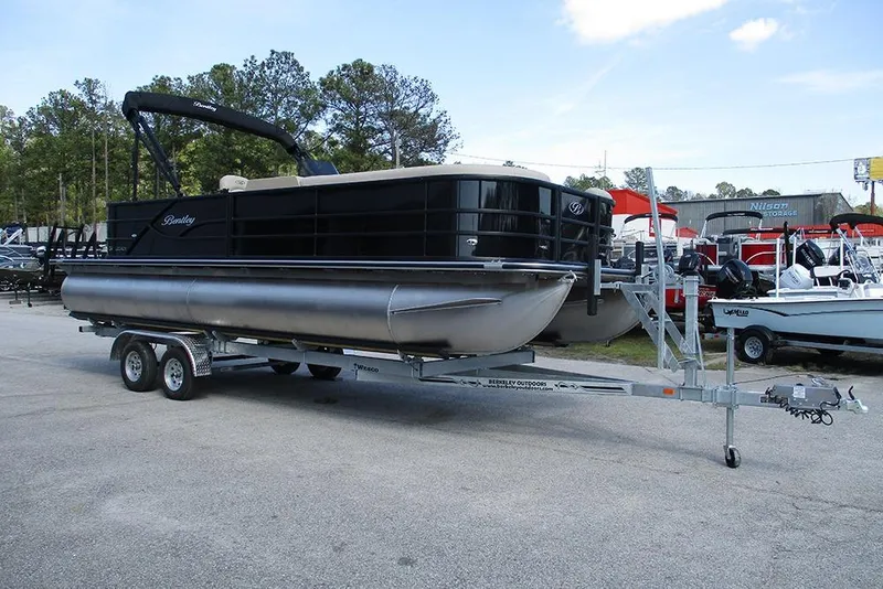 Slide: The Image of 2026 Bentley Pontoons Legacy 240 Cruise on trailer, parked outdoors. - 5