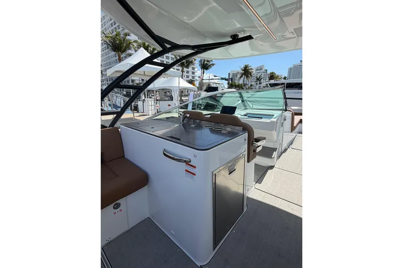 Slide: The Image of 2026 Jeanneau TH33 boat interior with modern amenities and sleek design. - 6