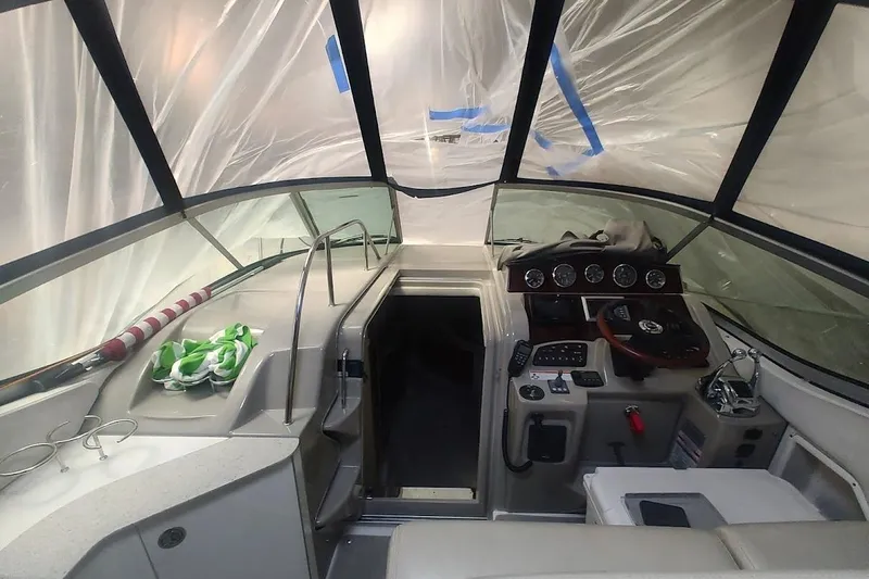 Slide: The Image of Interior of a 2008 Sea Ray Sundancer 310 boat with covered cockpit area. - 23