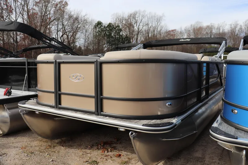 The Image of 2026 Bentley Pontoons LE 180 Cruise, beige exterior, parked outdoors, surrounded by trees. - 0