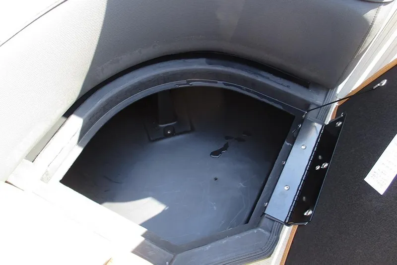 Slide: The Image of Storage compartment in 2026 Bentley Pontoons Elite 253 Swingback Dual Captain Full Tritoon. - 14