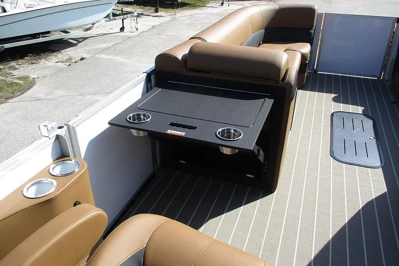 Slide: The Image of 2026 Bentley Pontoons Elite 253 interior with swingback seating and cup holders. - 28