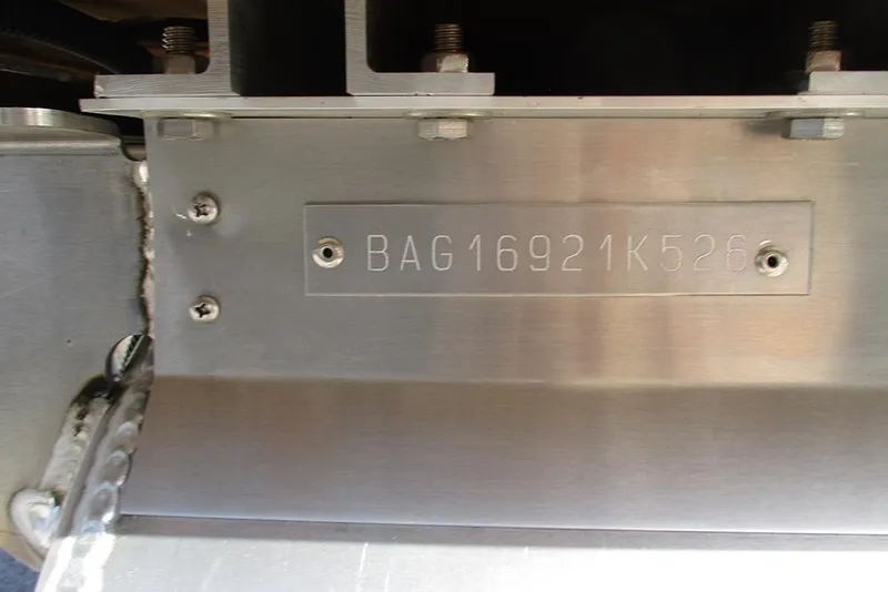 Slide: The Image of 2026 Bentley Pontoons Elite 253 Swingback Tritoon hull identification number plate. - 29