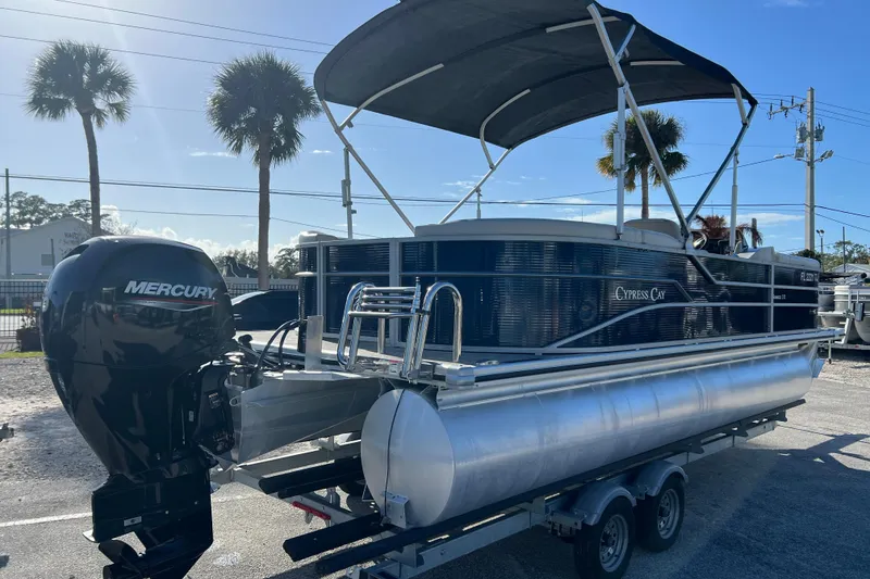 Slide: The Image of 2023 Cypress Cay Seabreeze 232 pontoon boat with Mercury engine on trailer. - 8