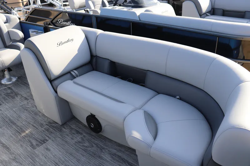 Slide: The Image of Luxurious seating on 2026 Bentley Pontoons Legacy 220 Navigator, featuring elegant gray upholstery. - 3