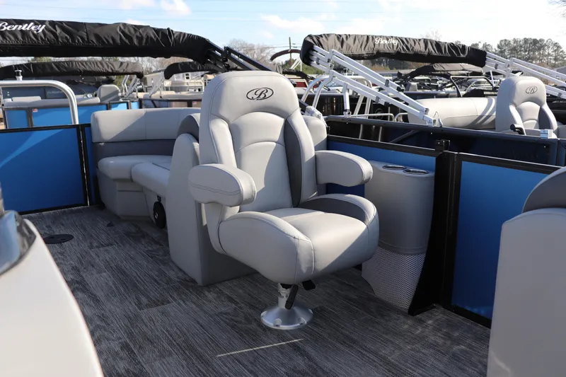 Slide: The Image of 2026 Bentley Pontoons Legacy 220 Navigator interior with luxurious seating and modern design. - 6