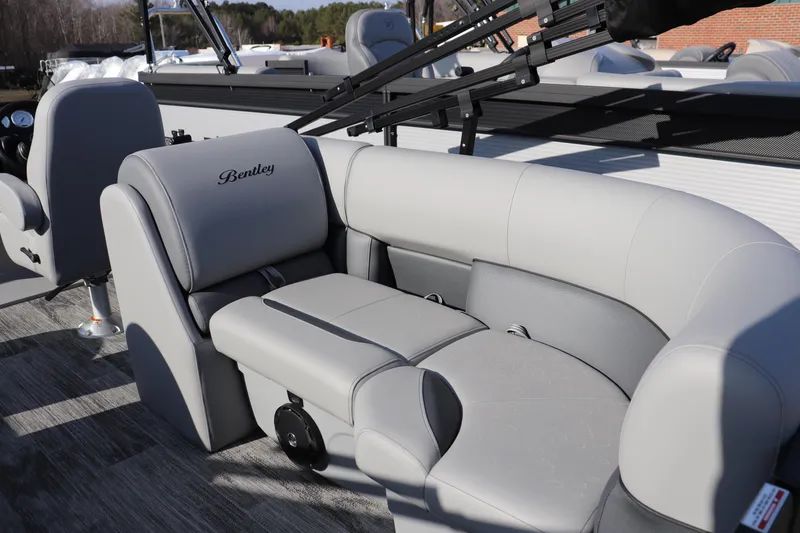 Slide: The Image of 2026 Bentley Pontoons Legacy 220 Navigator with luxurious gray seating and modern design. - 7