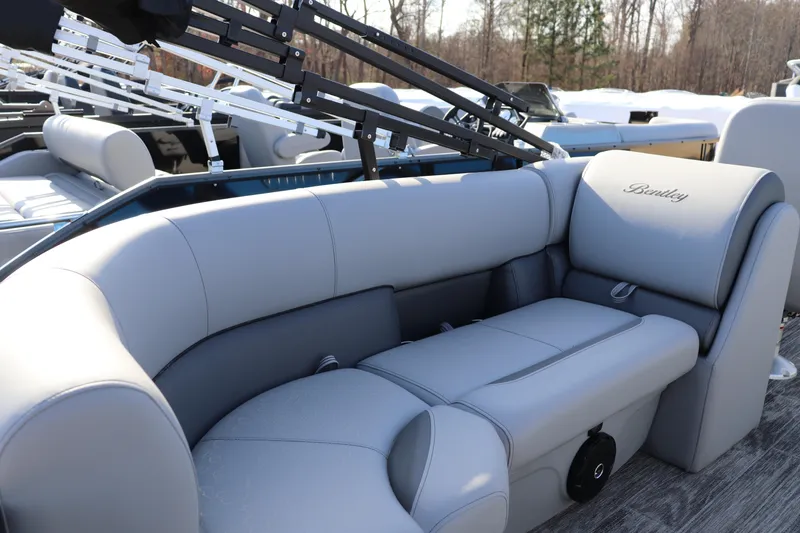 Slide: The Image of 2026 Bentley Pontoons Legacy 220 Navigator with luxurious seating and sleek design. - 8