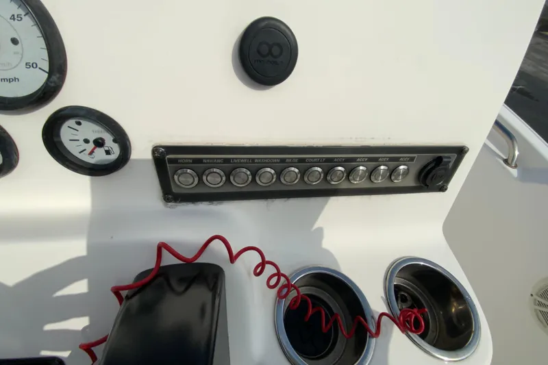 Slide: The Image of Control panel of 2017 Tidewater 198 CC Adventure boat with gauges and switches. - 14