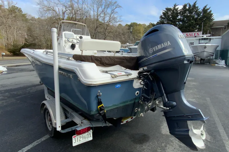 Slide: The Image of 2017 Tidewater 198 CC Adventure boat with Yamaha outboard motor on a trailer. - 7