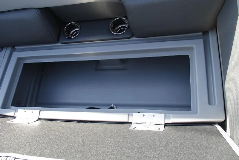 Slide: The Image of 2026 Bentley Pontoons Legacy 243 DL Navigator storage compartment with cup holders. - 13