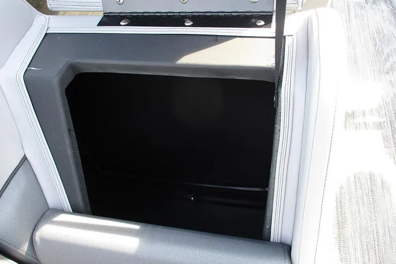 Slide: The Image of Storage compartment in 2026 Bentley Pontoons Legacy 243 DL Navigator boat. - 19