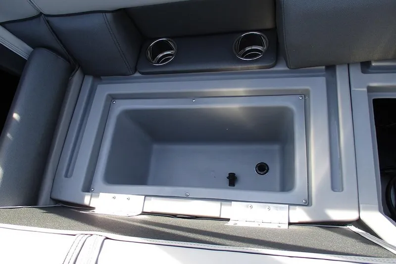 Slide: The Image of 2026 Bentley Pontoons Legacy 243 DL Navigator storage compartment with cup holders. - 22