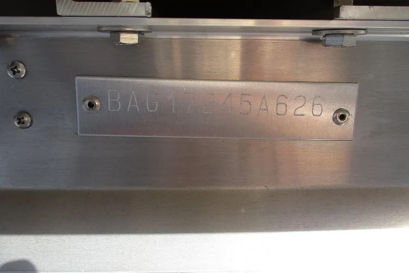 Slide: The Image of Hull identification number on Bentley Pontoons Legacy 243 DL Navigator, 2026 model. - 26