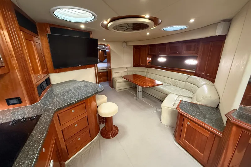 Slide: The Image of Luxurious interior of 2007 Cruisers Yachts 560 Express with leather seating and modern amenities. - 15
