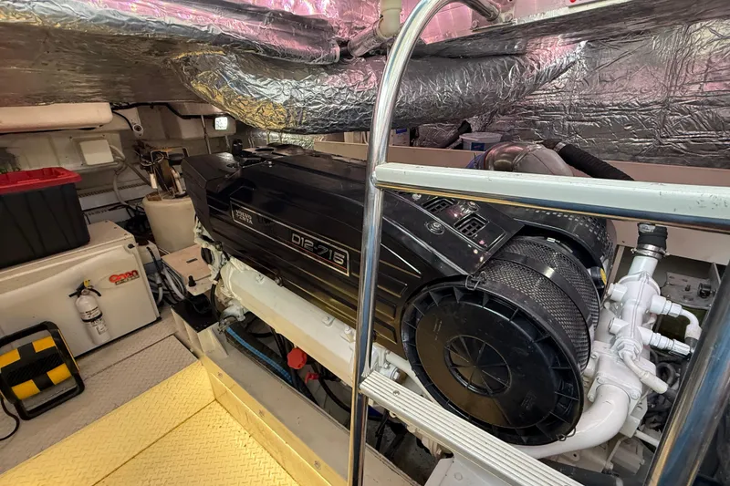 Slide: The Image of Engine room of 2007 Cruisers Yachts 560 Express with Volvo Penta engine. - 27