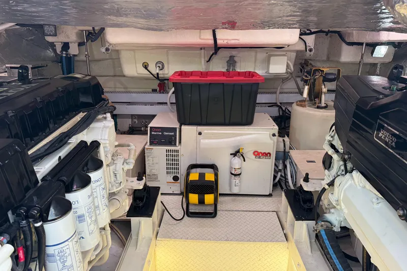 Slide: The Image of Engine room of 2007 Cruisers Yachts 560 Express with Onan generator and Volvo Penta engines. - 29