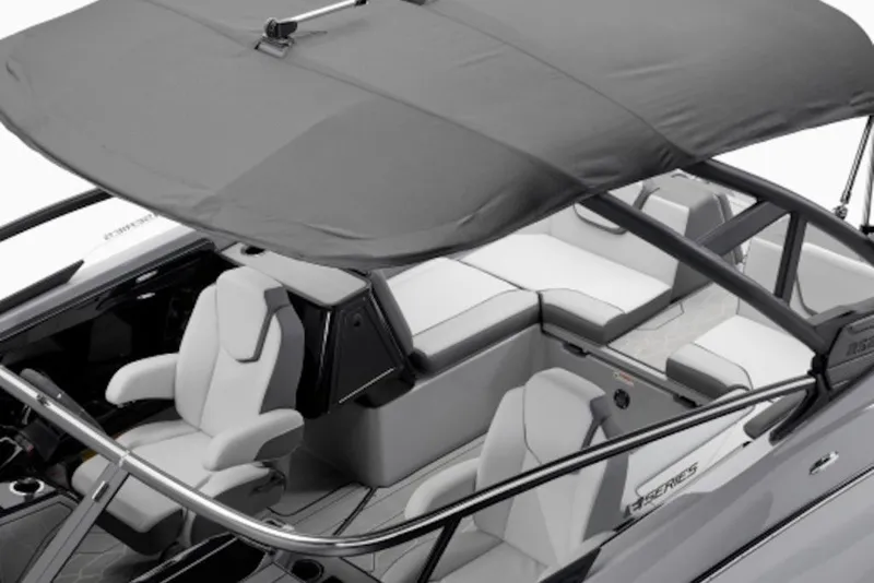 Slide: The Image of 2026 Yamaha Boats 252XE interior with seating and canopy, showcasing modern design. - 51