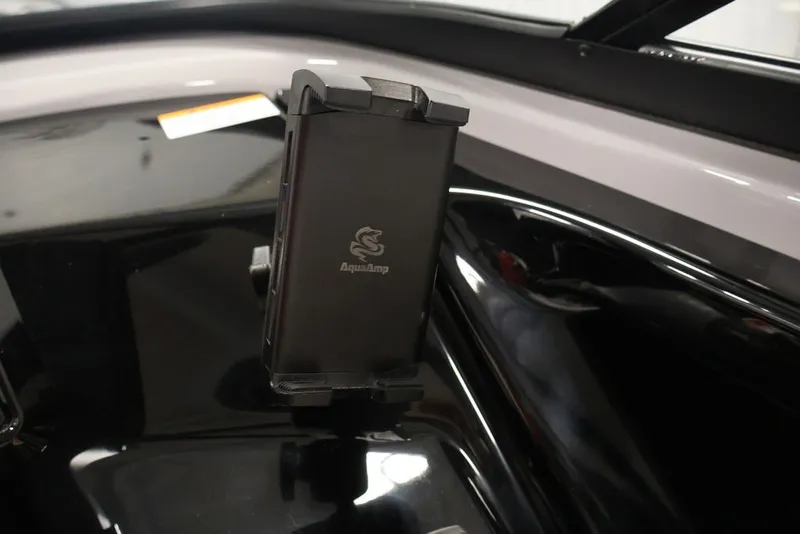Slide: The Image of AquaAmp device on 2026 Yamaha Boats 252XE dashboard. - 25