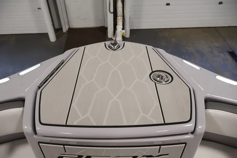 Slide: The Image of 2026 Yamaha Boats 252XE bow with sleek design and modern detailing. - 27