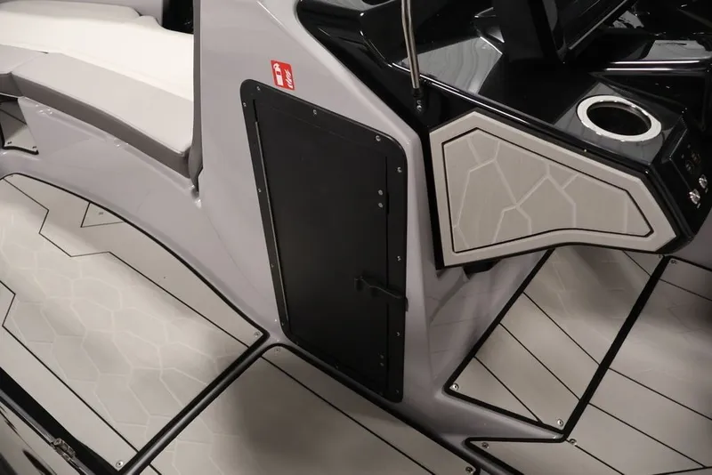 Slide: The Image of 2026 Yamaha Boats 252XE interior with sleek design, geometric patterns, and modern features. - 59