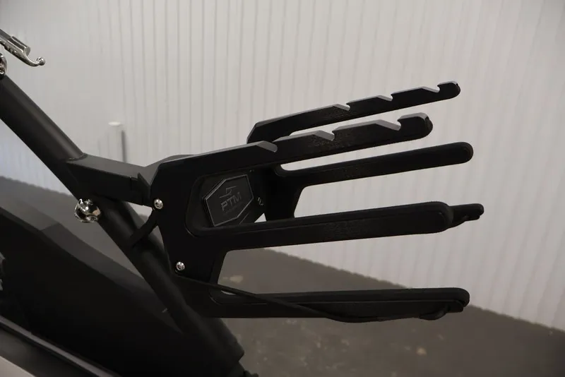 Slide: The Image of Wakeboard rack on 2026 Yamaha Boats 252XE, featuring sleek black design. - 16