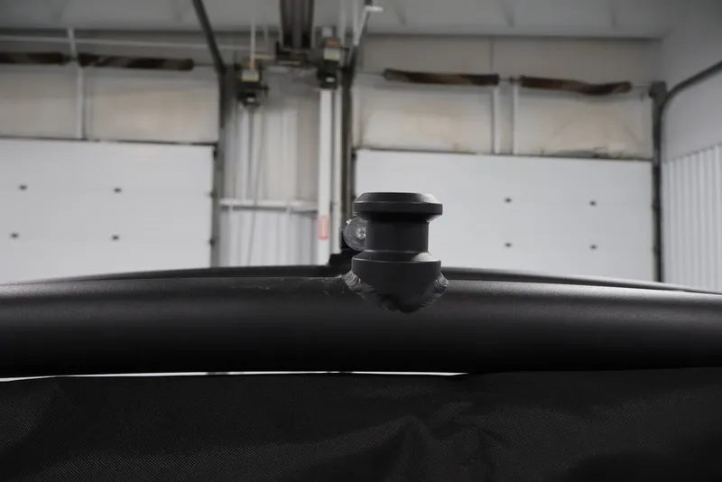 Slide: The Image of Close-up of a 2026 Yamaha Boats 252XE component in a garage setting. - 4
