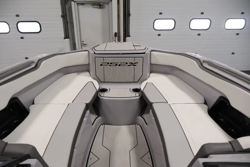 Slide: The Image of 2026 Yamaha Boats 252XE interior with sleek seating and modern design. - 39