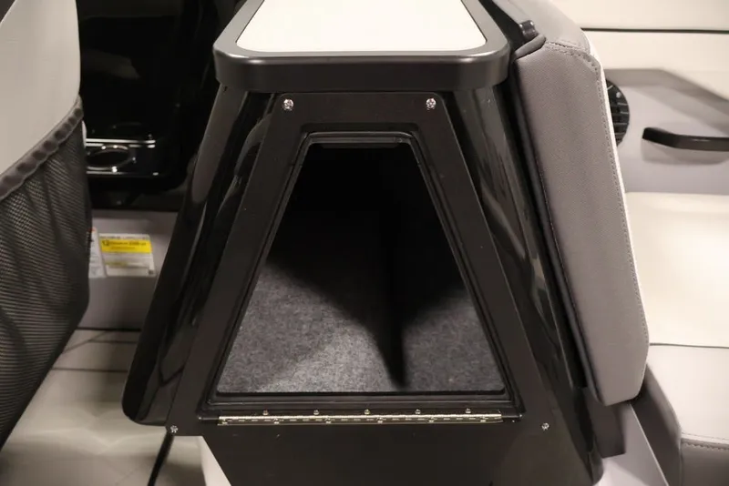 Slide: The Image of Interior storage compartment of 2026 Yamaha Boats 252XE, featuring sleek design and ample space. - 7