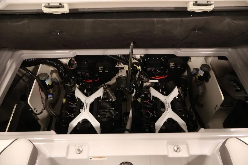 Slide: The Image of Engine compartment of 2026 Yamaha Boats 252XE, showcasing dual engines and components. - 31