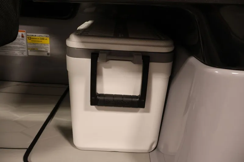 Slide: The Image of Storage compartment with cooler on 2026 Yamaha Boats 252XE. - 15