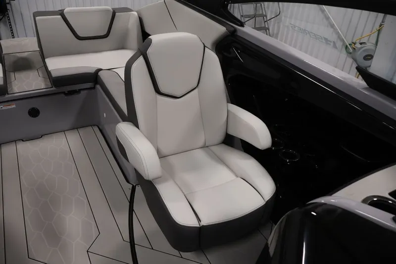 Slide: The Image of 2026 Yamaha Boats 252XE interior with sleek, modern seating and stylish design. - 26
