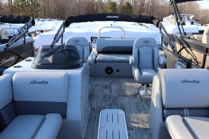 Slide: The Image of 2026 Bentley Pontoons Legacy 223 Swingback interior with luxurious seating and modern design. - 1