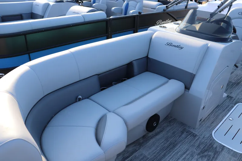 Slide: The Image of 2026 Bentley Pontoons Legacy 223 Swingback with luxurious seating and sleek design. - 2