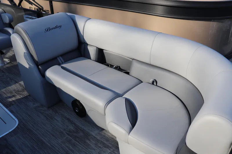 Slide: The Image of 2026 Bentley Pontoons Legacy 223 Swingback interior with luxurious gray seating. - 3