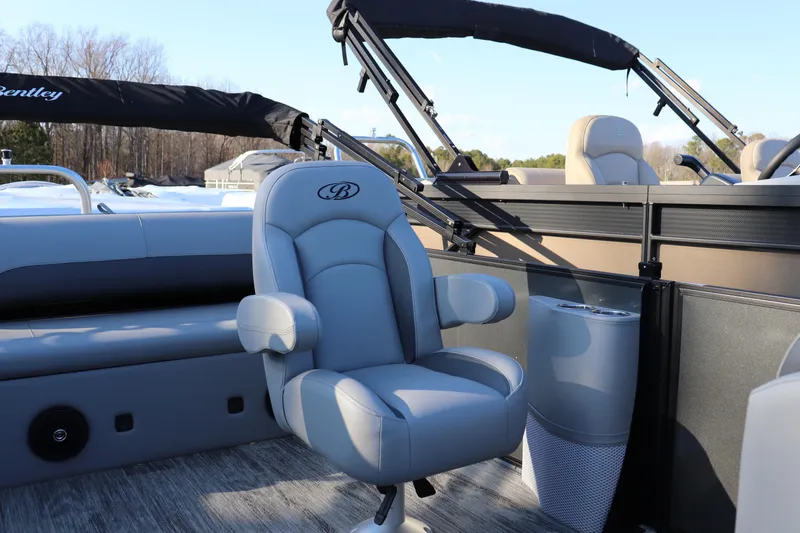 Slide: The Image of 2026 Bentley Pontoons Legacy 223 Swingback interior with luxurious seating and modern design. - 6