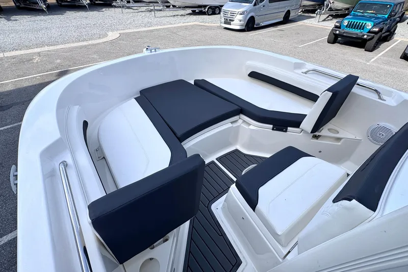 Slide: The Image of 2026 Trophy CC20 boat interior with cushioned seating and sleek design. - 12