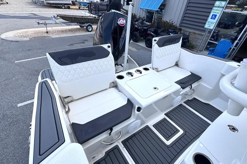 Slide: The Image of 2026 Trophy CC20 boat interior with seating and storage compartments. - 7