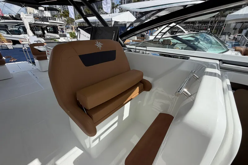 Slide: The Image of Luxurious Jeanneau TH38 boat interior, featuring sleek seating and modern design, 2026 model. - 10