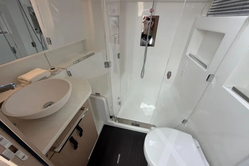 Slide: The Image of Modern bathroom in 2026 Jeanneau TH38 yacht with sleek fixtures and elegant design. - 16