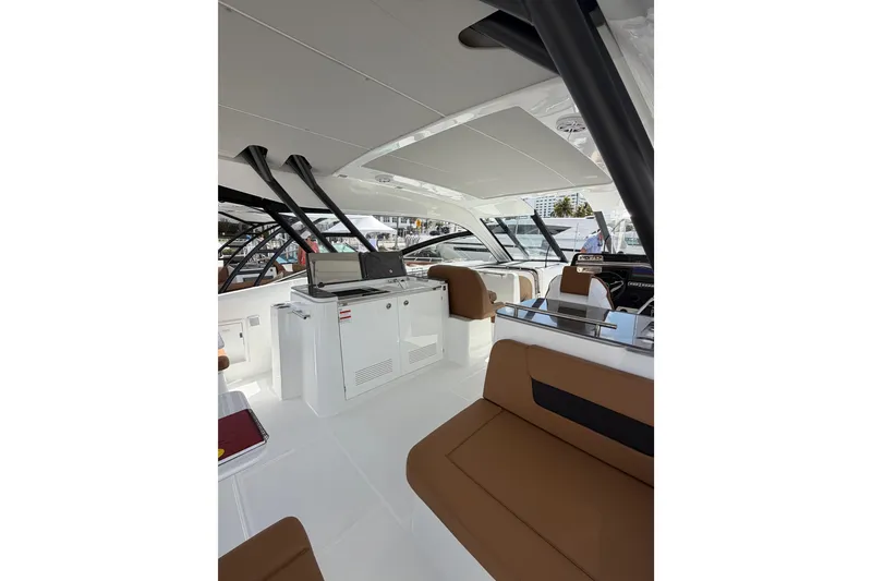 Slide: The Image of Luxurious interior of 2026 Jeanneau TH38 yacht with modern seating and sleek design. - 9