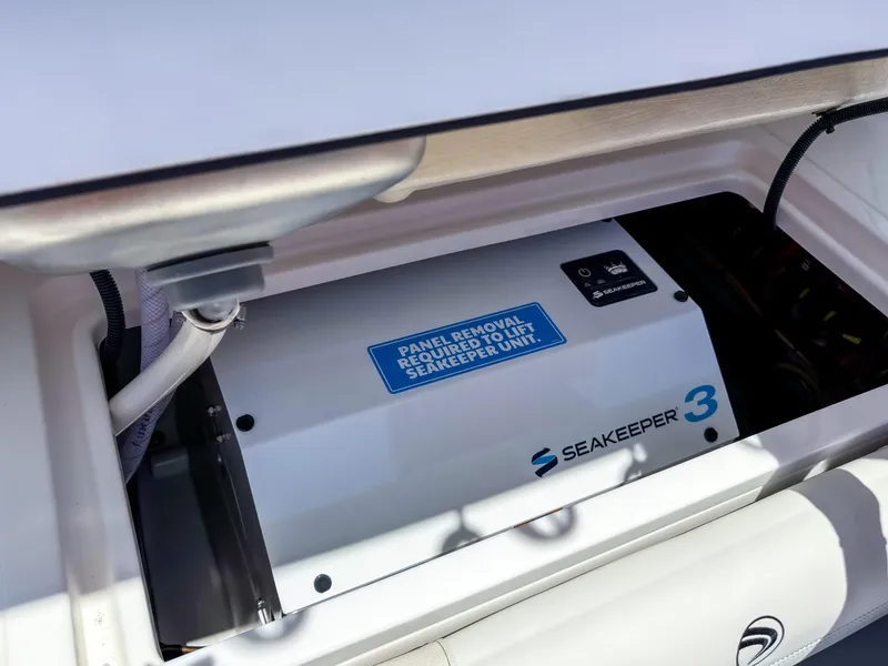 Slide: The Image of Seakeeper 3 stabilizer installed in 2025 Edgewater 370CC boat compartment. - 12