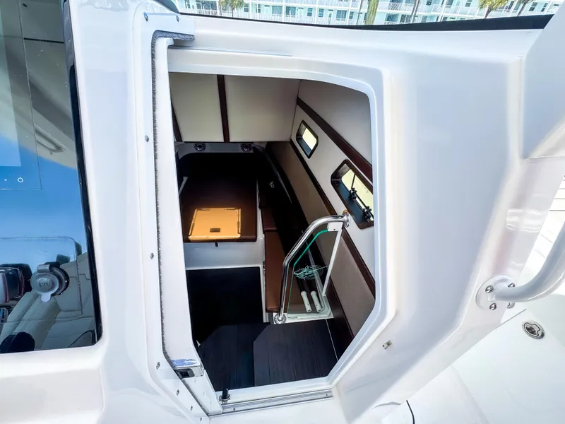 Slide: The Image of Interior cabin view of 2025 Edgewater 370CC boat, featuring modern design and sleek finishes. - 20