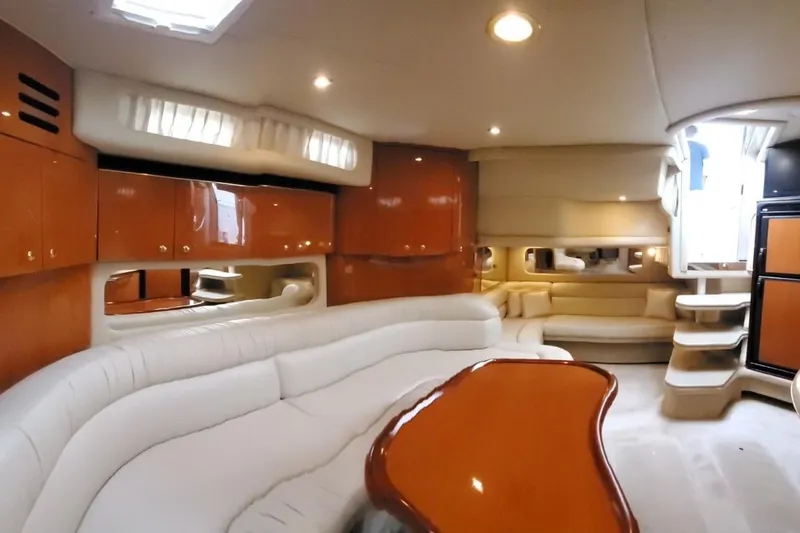 Slide: The Image of Luxurious interior of 2001 Sea Ray 380 Sundancer yacht with elegant seating and cabinetry. - 2