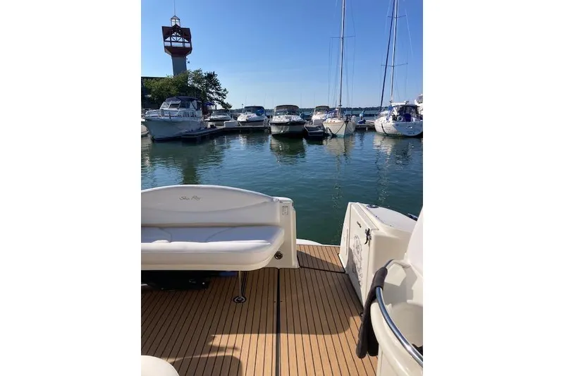 Slide: The Image of 2001 Sea Ray 380 Sundancer docked at marina with other boats. - 20