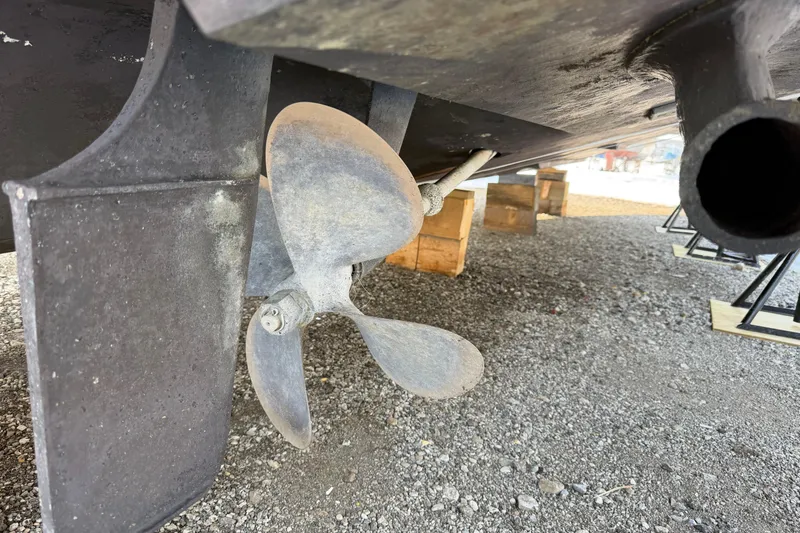 Slide: The Image of Propeller and rudder of a 2001 Sea Ray 380 Sundancer on dry dock. - 44