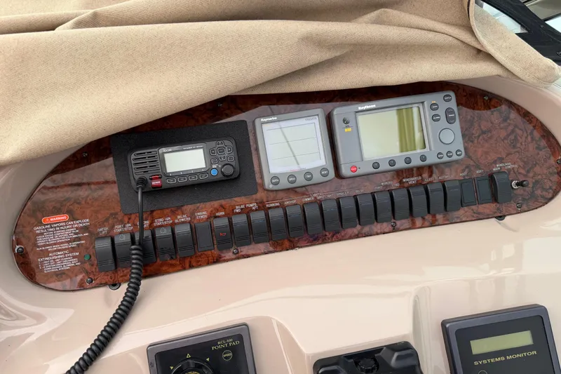 Slide: The Image of Control panel of a 2001 Sea Ray 380 Sundancer boat with navigation equipment. - 7