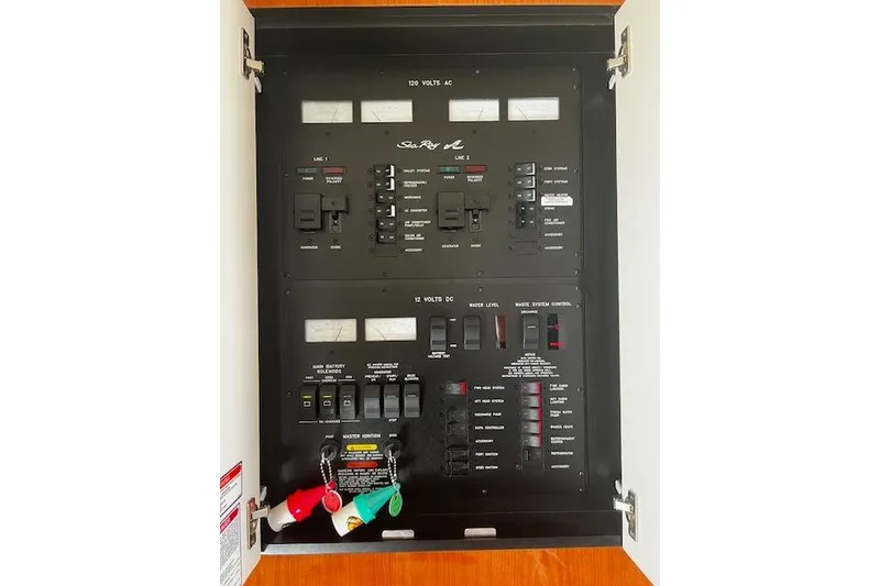 Slide: The Image of Electrical control panel of a 2001 Sea Ray 380 Sundancer boat. - 9