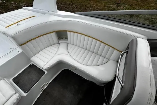 Slide: The Image of Luxurious white seating in a 2002 Cobalt 262 boat, featuring elegant design and comfort. - 28